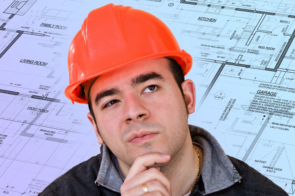 A construction worker pondering a question.