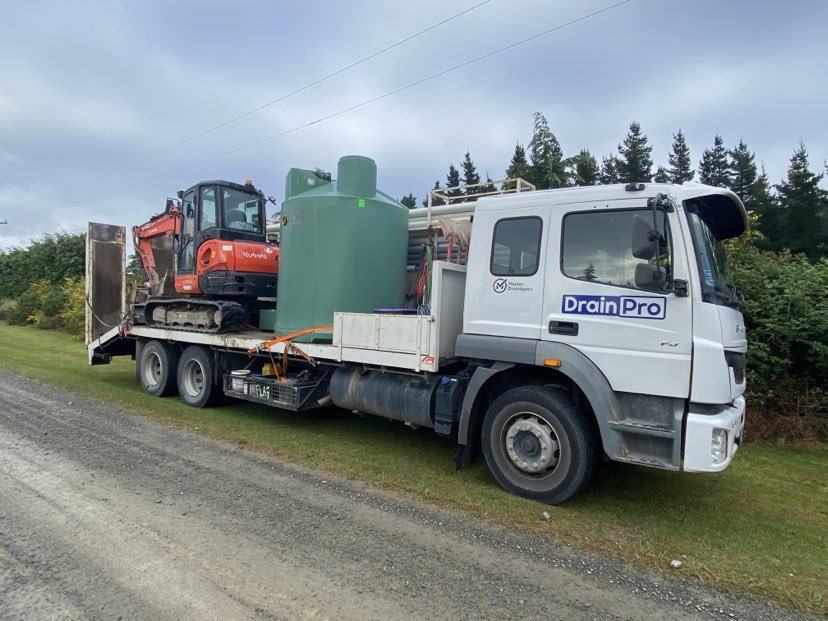 septic tank on the back of a truck
